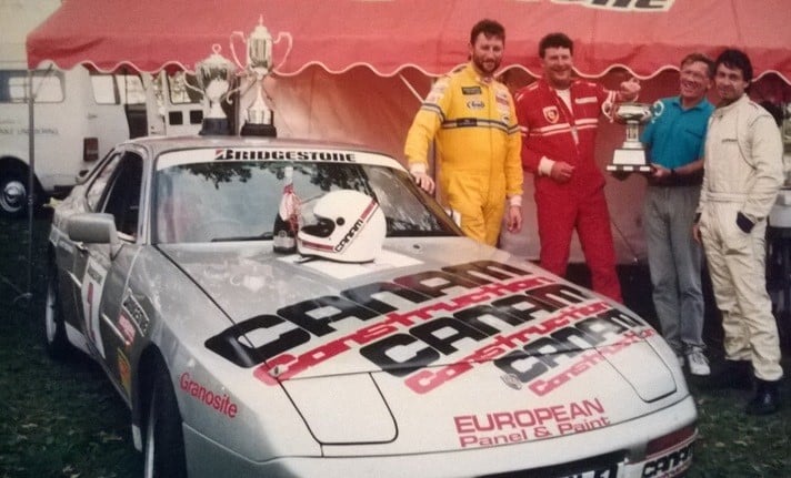 1991/92 Bridgestone - Porsche Club NZ Championship winners – from right : Graeme Cameron -Overall Champion and Class A Champion, Ian Paterson - Technical Manager of Bridgestone (NZ) Ltd holding the Overall Champion’s ‘Bridgestone Cup’, Patrick Hodgson - Class C Champion, and Rob Hurst - Class B Champion. The car in this photo is a Porsche 944 Turbo SE belonging to Graeme Cameron. Some of Graeme’s trophies are on the car – the Class A Trophy and the Peter Thorpy (Past President) Trophy. Not shown is the ‘Water Pumper Trophy’ also won by Graeme for the highest placed water cooled car. Photo from Glyn Taylor