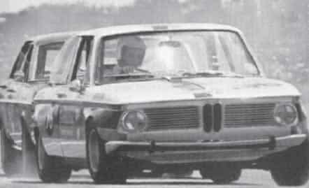 Rodger Anderson in his BMW 2002, leading Clyde Collins in the Falcon