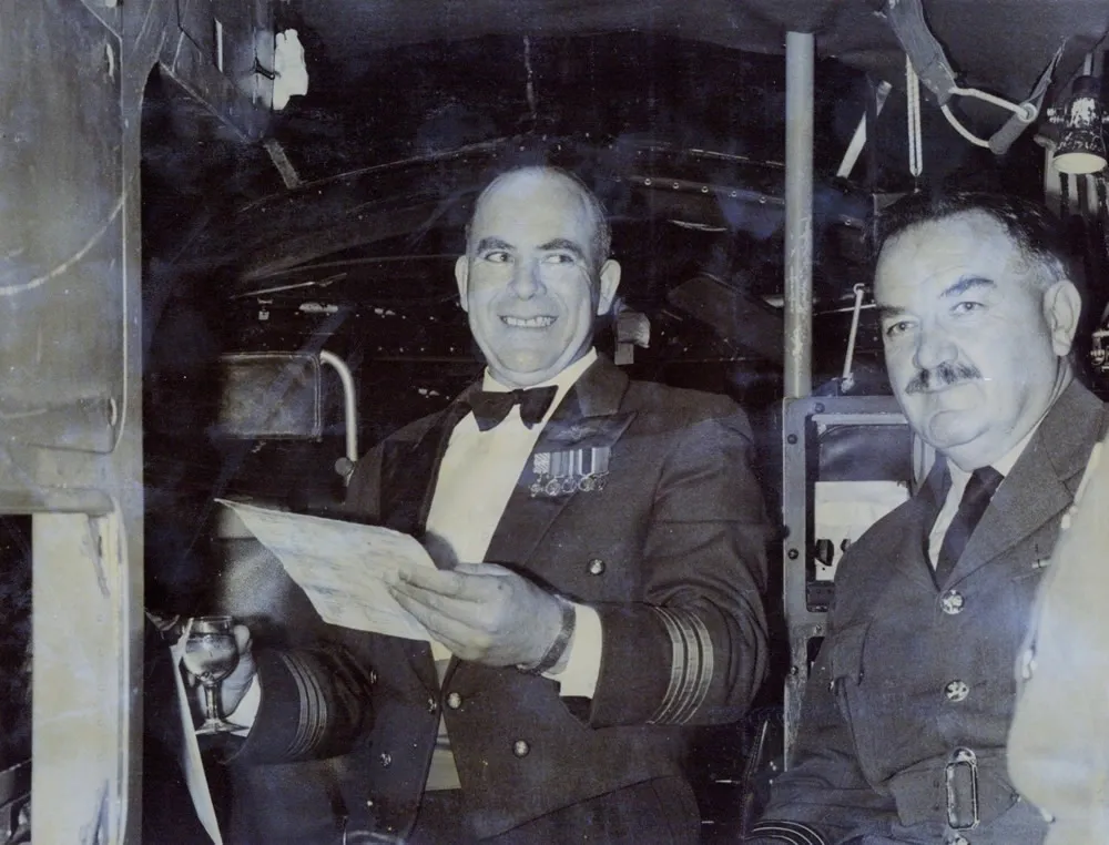 Drinks aboard Hastings CMK3 NZ5803 on the evening of 28th September 1967 – A farewell to Wg Cdr G.H.S. Tosland AFC and Bar, Base Commander RNZAF Ohakea, on his retirement from the RNZAF. Former fellow crew member and Hastings Wireless Operator, Wg Cdr A.G.E. ‘Butch’ Pugh, shares the moment – photo by RNZAF Ohakea via Jim Barclay