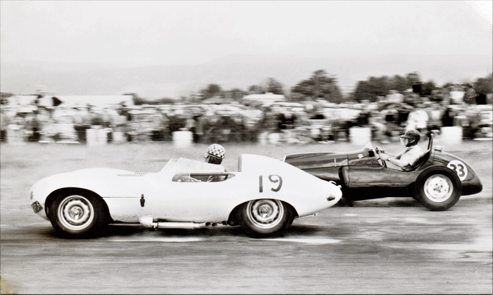 Levin 29 Nov 58 - #19 Bruce Webster driving Angus Hyslop’s Jaguar D-Type, and #33 Len Gilbert Cooper T23-Bristol Mk2 at ‘Cabbage Tree’ corner – photo Steele Therkelson in Len Gilbert Collection