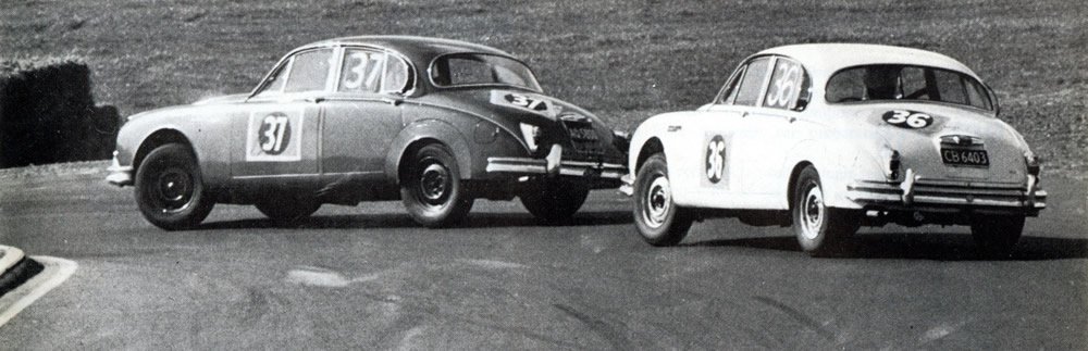 Pukekohe 9 Oct 65 Wills Six-Hour race, the #37 Archibald/Sprague Jaguar Mk2 3.8 leads #36 Ward/Coppins Mk2 3.8. The #36 car won the race – photo Euan Sarginson in Shell Book of NZ Motor Racing 1966