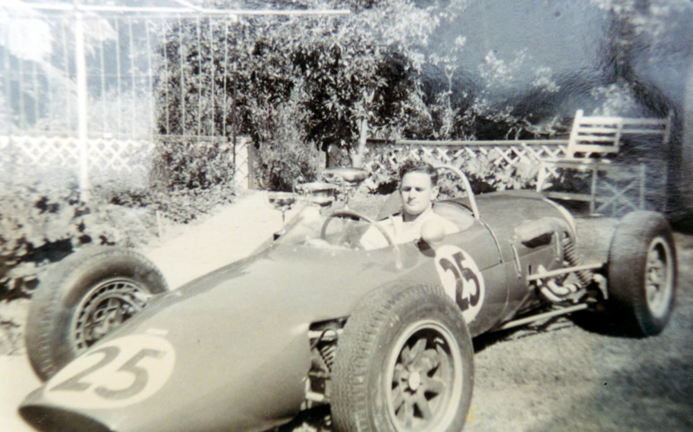 Rex with his Gemini and HVMC trophies in the garden at 716 High Street, Lower Hutt – photo Rex Flowers Collection