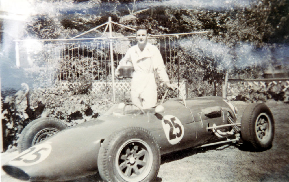 Rex with his Gemini and HVMC trophies in the garden at 716 High Street, Lower Hutt – photo Rex Flowers Collection