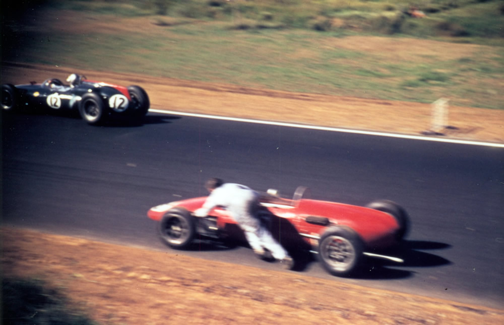 Pukekohe 5th January 1963 - Rex Flowers pushing his Gemini to the finish as #12 Jim Palmer Cooper T53 Climax 2.7 passes by – photo unknown in Jim Barclay Collection