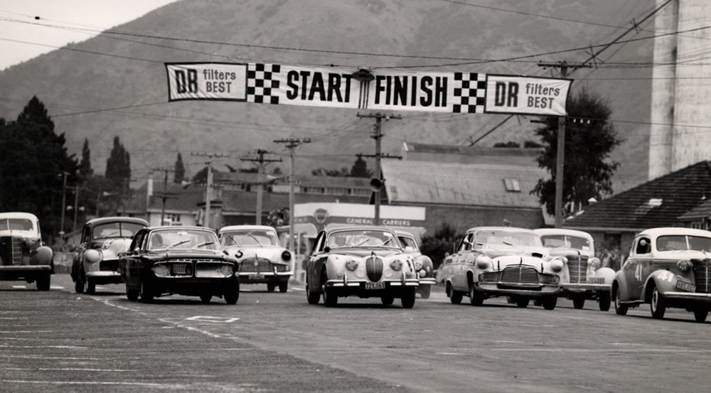 Waimate 1 Feb 64 – Front row from left – 50 Ernie Sprague Ford Zephyr Mk3, 10 Ian Dow Jaguar Mk2 3.8, 12 Norm Masters Ford Zephyr Mk2, 41 Peter Gillum Chev Coupe. Row 2 - 14 John Laney Holden, 5 John Armstrong Ford Zephyr Mk2, 23 N. Ord Jaguar Mk2 2.4 – photo unknown